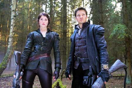 Gemma Aterton and Jerem Renner as Hansel and Gretel Witch Hunters movie still